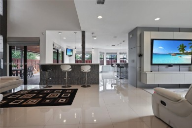 Stunning corner-lot home built in 2012, featuring modern design on Fontainebleau Golf Course in Florida - for sale on GolfHomes.com, golf home, golf lot