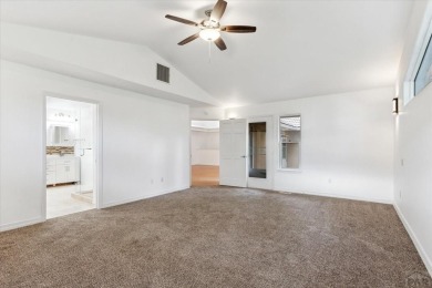 Live the Golf Course Dream at 444 W Archer Dr. Where every day on Desert Hawk At Pueblo West in Colorado - for sale on GolfHomes.com, golf home, golf lot