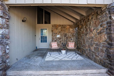 This FURNISHED Eden Isle townhome is right across the street on Red Apple Inn and Country Club in Arkansas - for sale on GolfHomes.com, golf home, golf lot