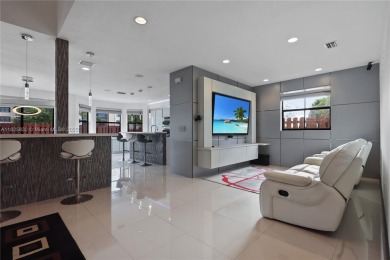 Stunning corner-lot home built in 2012, featuring modern design on Fontainebleau Golf Course in Florida - for sale on GolfHomes.com, golf home, golf lot