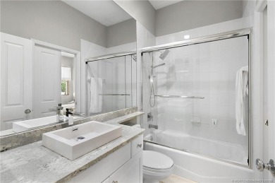 Awaken to golden sunrises glimmering across the lake and on  in Florida - for sale on GolfHomes.com, golf home, golf lot