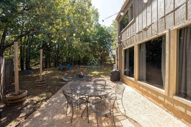 This FURNISHED Eden Isle townhome is right across the street on Red Apple Inn and Country Club in Arkansas - for sale on GolfHomes.com, golf home, golf lot