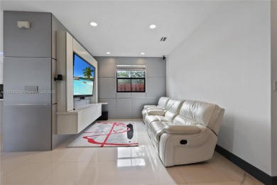 Stunning corner-lot home built in 2012, featuring modern design on Fontainebleau Golf Course in Florida - for sale on GolfHomes.com, golf home, golf lot