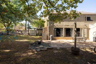 This FURNISHED Eden Isle townhome is right across the street on Red Apple Inn and Country Club in Arkansas - for sale on GolfHomes.com, golf home, golf lot