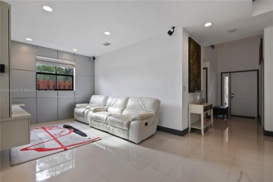 Stunning corner-lot home built in 2012, featuring modern design on Fontainebleau Golf Course in Florida - for sale on GolfHomes.com, golf home, golf lot
