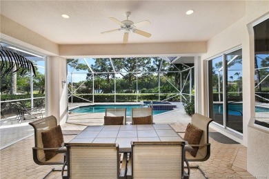 Awaken to golden sunrises glimmering across the lake and on  in Florida - for sale on GolfHomes.com, golf home, golf lot