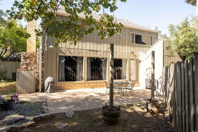 This FURNISHED Eden Isle townhome is right across the street on Red Apple Inn and Country Club in Arkansas - for sale on GolfHomes.com, golf home, golf lot