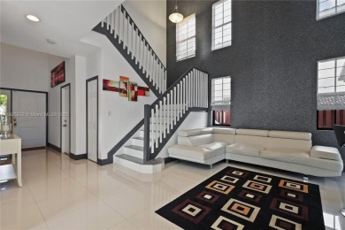 Stunning corner-lot home built in 2012, featuring modern design on Fontainebleau Golf Course in Florida - for sale on GolfHomes.com, golf home, golf lot