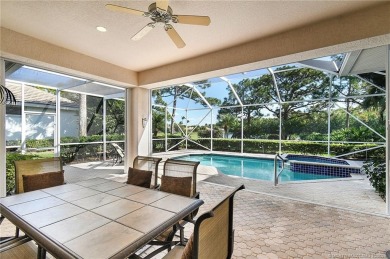 Awaken to golden sunrises glimmering across the lake and on  in Florida - for sale on GolfHomes.com, golf home, golf lot