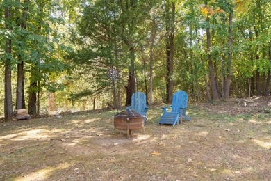 This FURNISHED Eden Isle townhome is right across the street on Red Apple Inn and Country Club in Arkansas - for sale on GolfHomes.com, golf home, golf lot