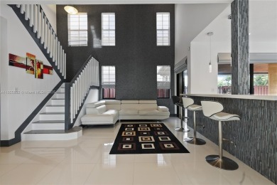 Stunning corner-lot home built in 2012, featuring modern design on Fontainebleau Golf Course in Florida - for sale on GolfHomes.com, golf home, golf lot
