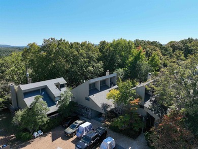 This FURNISHED Eden Isle townhome is right across the street on Red Apple Inn and Country Club in Arkansas - for sale on GolfHomes.com, golf home, golf lot