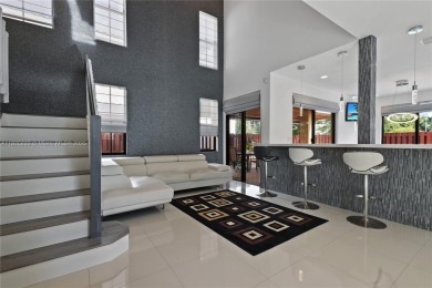Stunning corner-lot home built in 2012, featuring modern design on Fontainebleau Golf Course in Florida - for sale on GolfHomes.com, golf home, golf lot
