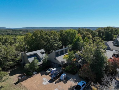 This FURNISHED Eden Isle townhome is right across the street on Red Apple Inn and Country Club in Arkansas - for sale on GolfHomes.com, golf home, golf lot