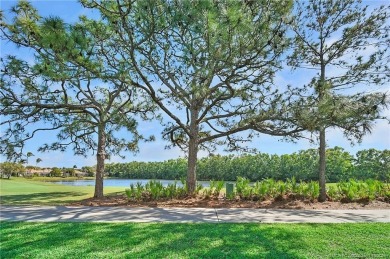 Awaken to golden sunrises glimmering across the lake and on  in Florida - for sale on GolfHomes.com, golf home, golf lot