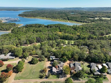 This FURNISHED Eden Isle townhome is right across the street on Red Apple Inn and Country Club in Arkansas - for sale on GolfHomes.com, golf home, golf lot