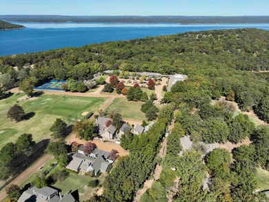 This FURNISHED Eden Isle townhome is right across the street on Red Apple Inn and Country Club in Arkansas - for sale on GolfHomes.com, golf home, golf lot