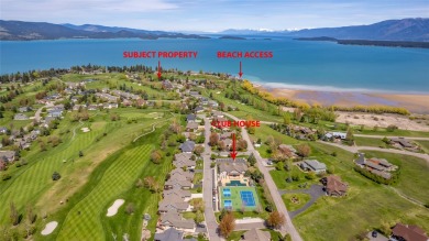Enjoy mountain and peek-a-boo lake views from this .22 acre golf on Polson Bay Golf Course - Championship Course in Montana - for sale on GolfHomes.com, golf home, golf lot