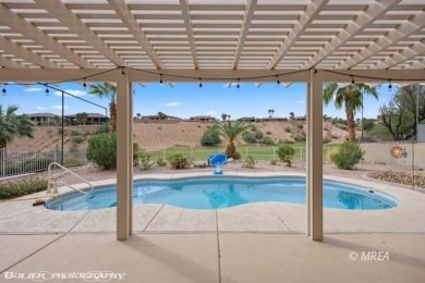 This custom home is located on a quarter acre home site in on Falcon Ridge Golf Course in Nevada - for sale on GolfHomes.com, golf home, golf lot