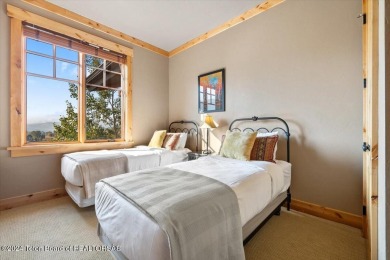 Experience Top-Floor Living with Breathtaking Sunsets at The on Teton Springs Resort and Club in Idaho - for sale on GolfHomes.com, golf home, golf lot