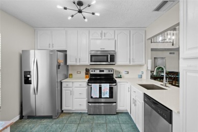 PRICED UNDER APPRAISED VALUE - OFFERING A BUYER INSTANT HOME on Isla Del Sol Yacht and Country Club in Florida - for sale on GolfHomes.com, golf home, golf lot