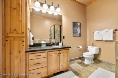 Experience Top-Floor Living with Breathtaking Sunsets at The on Teton Springs Resort and Club in Idaho - for sale on GolfHomes.com, golf home, golf lot