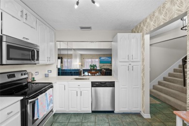 PRICED UNDER APPRAISED VALUE - OFFERING A BUYER INSTANT HOME on Isla Del Sol Yacht and Country Club in Florida - for sale on GolfHomes.com, golf home, golf lot