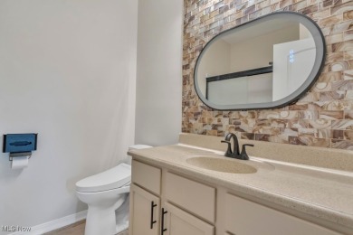Enjoy peaceful golf course views and effortless one-floor living on Fox Creek Golf and Racquet Club in Ohio - for sale on GolfHomes.com, golf home, golf lot