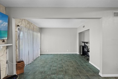 PRICED UNDER APPRAISED VALUE - OFFERING A BUYER INSTANT HOME on Isla Del Sol Yacht and Country Club in Florida - for sale on GolfHomes.com, golf home, golf lot