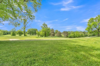 Enjoy peaceful golf course views and effortless one-floor living on Fox Creek Golf and Racquet Club in Ohio - for sale on GolfHomes.com, golf home, golf lot