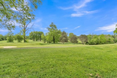 Enjoy peaceful golf course views and effortless one-floor living on Fox Creek Golf and Racquet Club in Ohio - for sale on GolfHomes.com, golf home, golf lot