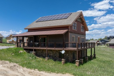 This 5-bedroom 4.5 Bathroom home on .28 acre is a blend of on Headwaters Golf Course At Granby Ranch in Colorado - for sale on GolfHomes.com, golf home, golf lot