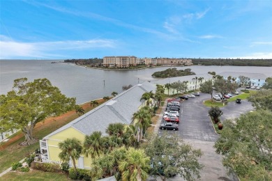 Turn Key-Desirable corner unit in the exclusive, resort-style on St. Petersburg Country Club in Florida - for sale on GolfHomes.com, golf home, golf lot