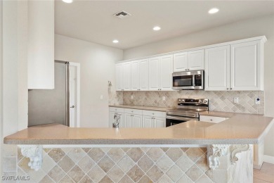 This stunning three-bedroom, 2.5-bath home in Crown Colony on Crown Colony Golf and Country Club in Florida - for sale on GolfHomes.com, golf home, golf lot