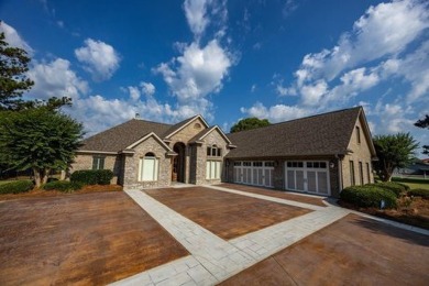 Discover luxury living at its finest in this custom-built home on Red Eagle Golf Course in Alabama - for sale on GolfHomes.com, golf home, golf lot