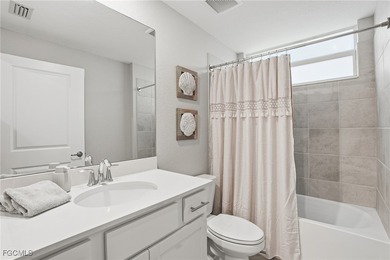 Wake up to shimmering water views and end every day with on Heritage Landing Golf  in Florida - for sale on GolfHomes.com, golf home, golf lot