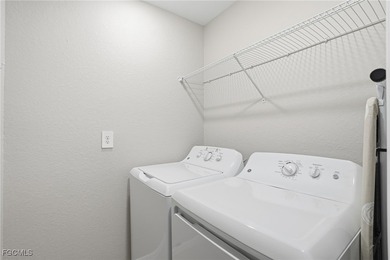 Wake up to shimmering water views and end every day with on Heritage Landing Golf  in Florida - for sale on GolfHomes.com, golf home, golf lot