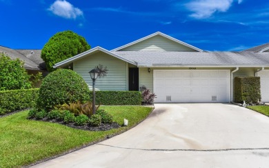 Discover the serene lifestyle of Eaglewood with this charming on Eagle Wood Golf Course in Florida - for sale on GolfHomes.com, golf home, golf lot