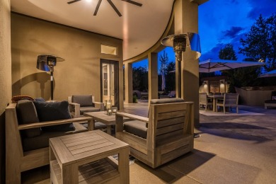 Tucked along the 18th fairway in Paa-Ko, this stunning custom on Paa-Ko Ridge Golf Club  in New Mexico - for sale on GolfHomes.com, golf home, golf lot