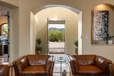 Tucked along the 18th fairway in Paa-Ko, this stunning custom on Paa-Ko Ridge Golf Club  in New Mexico - for sale on GolfHomes.com, golf home, golf lot