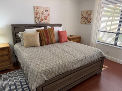 This stunning first-floor condo offers a spacious and modern on Boca Pointe Country Club in Florida - for sale on GolfHomes.com, golf home, golf lot