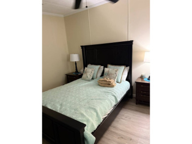This lovely, home is in an age 55+ community but age 40+ is on Pine Lakes Country Club in Florida - for sale on GolfHomes.com, golf home, golf lot