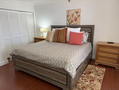 This stunning first-floor condo offers a spacious and modern on Boca Pointe Country Club in Florida - for sale on GolfHomes.com, golf home, golf lot
