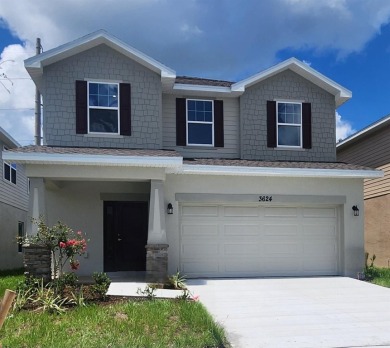 ** Brand New move-in ready Home 4 bedrooms and 2.5 bathrooms on Harmony Golf Preserve in Florida - for sale on GolfHomes.com, golf home, golf lot