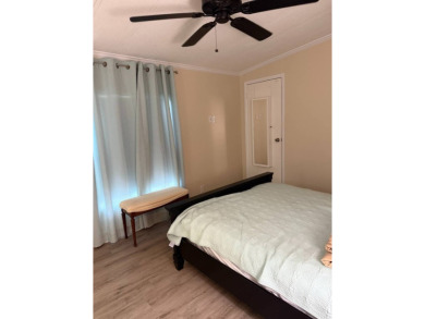 This lovely, home is in an age 55+ community but age 40+ is on Pine Lakes Country Club in Florida - for sale on GolfHomes.com, golf home, golf lot