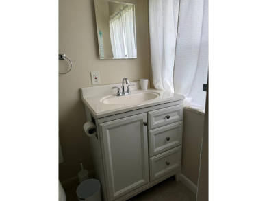 This lovely, home is in an age 55+ community but age 40+ is on Pine Lakes Country Club in Florida - for sale on GolfHomes.com, golf home, golf lot