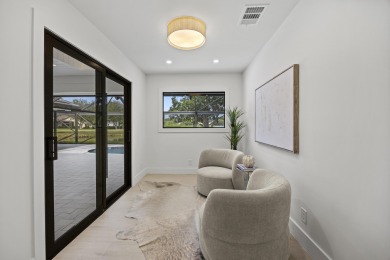 Designed to impress! This recently renovated 4,500 sq. ft on PGA National Golf Club in Florida - for sale on GolfHomes.com, golf home, golf lot