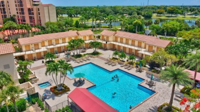 This stunning first-floor condo offers a spacious and modern on Boca Pointe Country Club in Florida - for sale on GolfHomes.com, golf home, golf lot