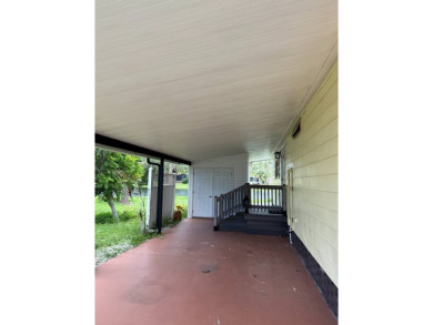 This lovely, home is in an age 55+ community but age 40+ is on Pine Lakes Country Club in Florida - for sale on GolfHomes.com, golf home, golf lot