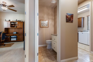 Wake up to sweeping views of Hurricane Cliffs, Zion, and the on Coral Canyon Golf Course in Utah - for sale on GolfHomes.com, golf home, golf lot
